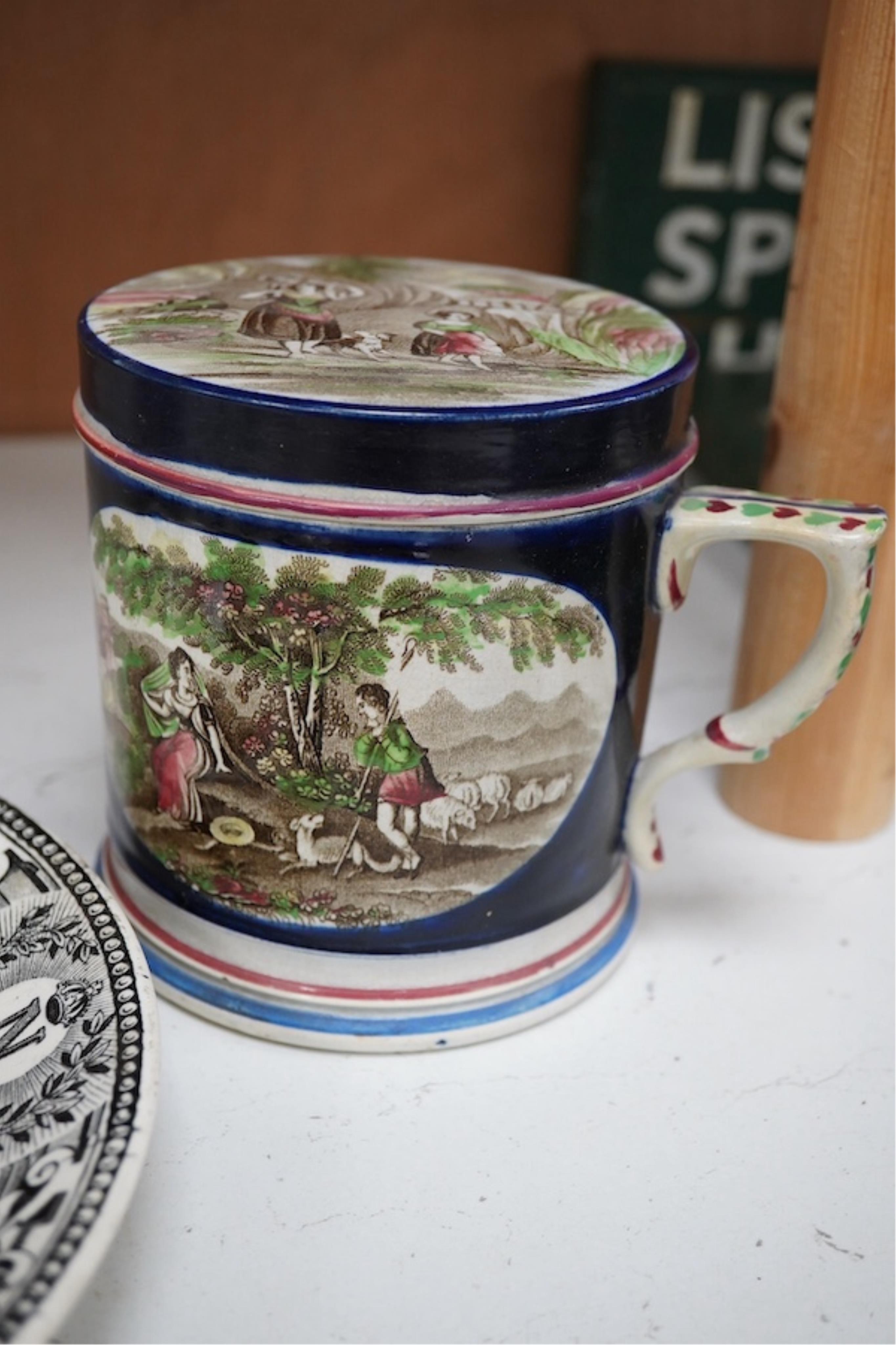 A mid 19th century pearlware teapot, a moustache mug and cover, two chinoiserie tiles and a Napoleon black and white transfer dish, Madrid 1808. Teapot and cover 16cm high. Condition - tile and teapot spout chipped